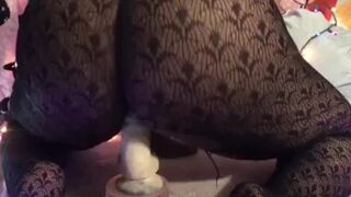Bouncing Gigantic Chocolate Rear-End on White Dildo
