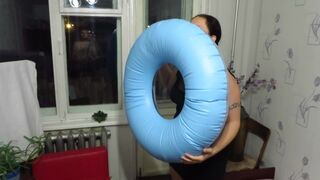 A Old Aunt Puffs up a Circle and Jumps on It. Inflatable Bizarre