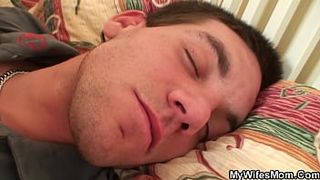 Older mother GF wakes him up for taboo sex