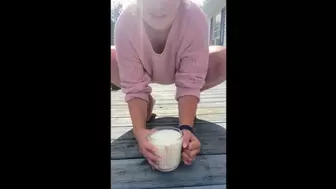 Slutty big beautiful woman pours milk on feet and soles outdoors