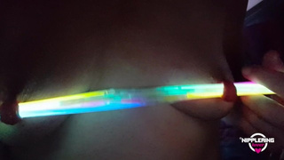 nippleringlover horny milf inserting multiple glow sticks in extreme stretched pierced nipples one