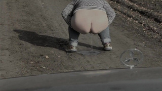 Pissing on the road older big bodied woman milf.