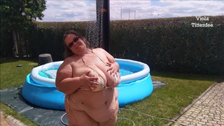 slomo SSBBW with gigantic natural breasts tiny bikini shower - by Viola Tittenfee